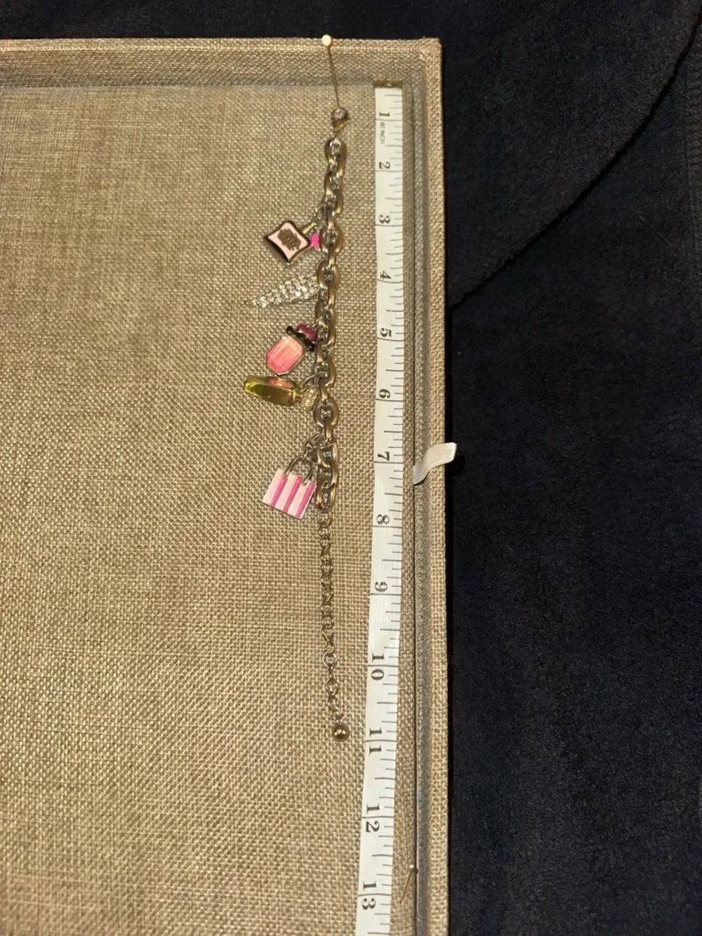 Gold-Tone Pink Charm Bracelet with Shopping & Beauty Pendants